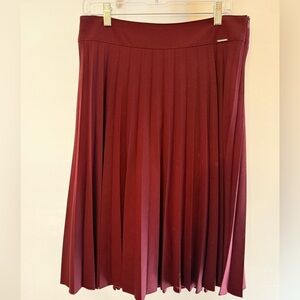 GUZELLA DESIGNER PLEADED BURGUNDY MIDI SKIRT SIZE 10
